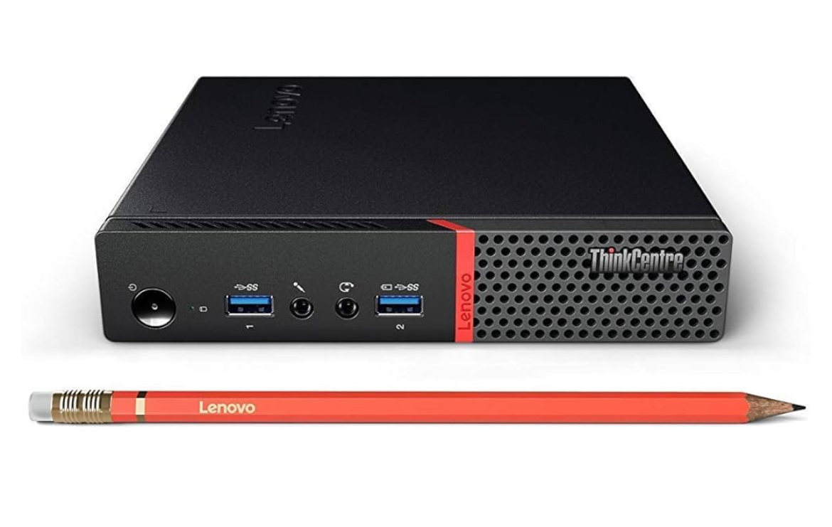 Lenovo ThinkCentre m900 Tiny with an orange pencil in front